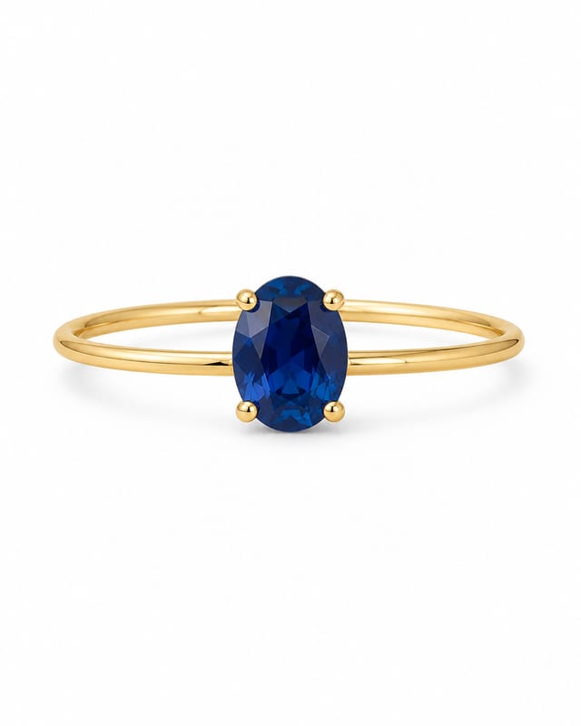 The oval birthstone ring with a deep blue September sapphire-coloured stone